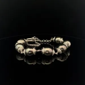 18k white gold .50ct G VS2 Round diamond and Tahitian Pearl Bracelet