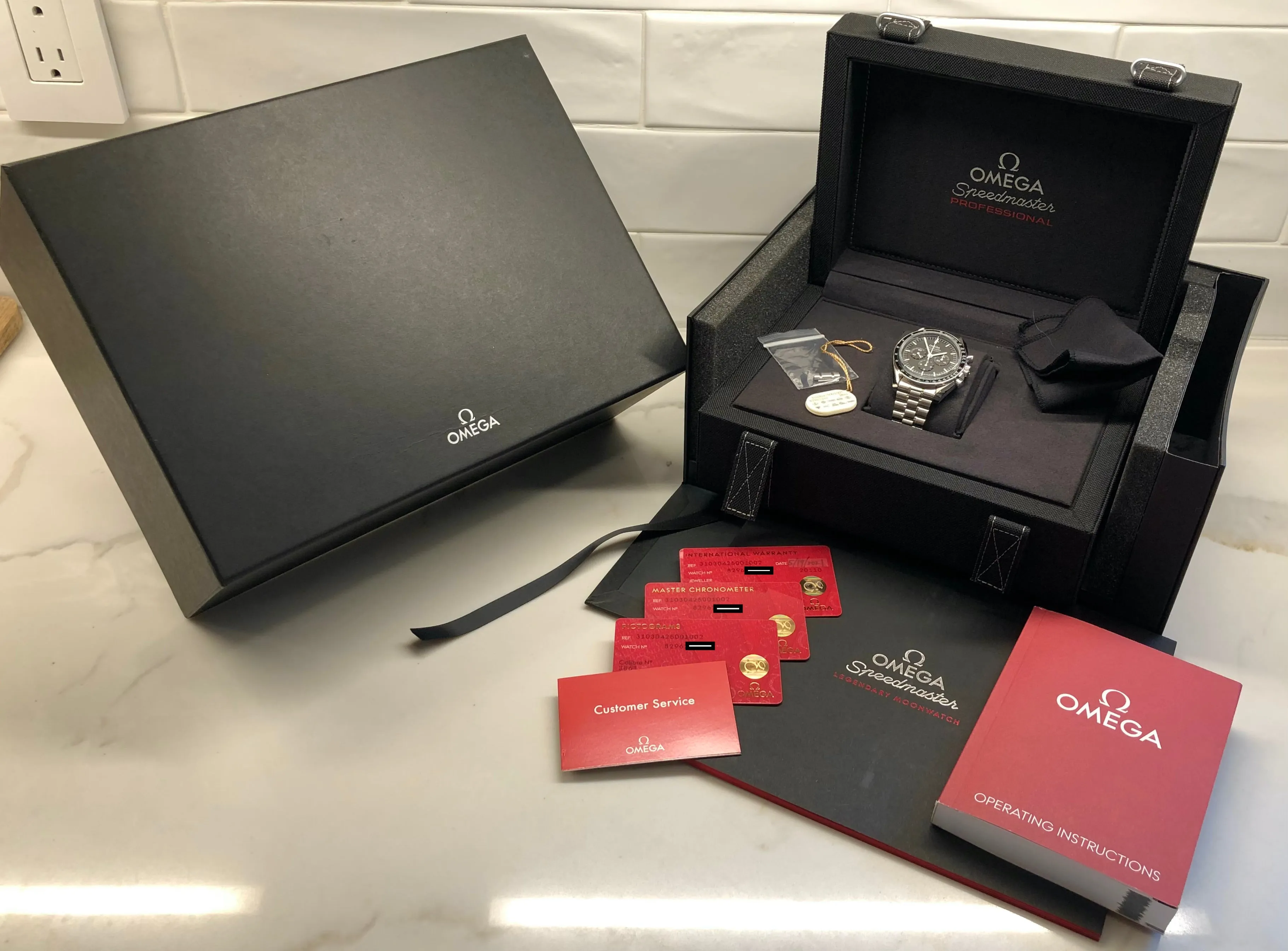 2021 Omega Speedmaster Moonwatch 310.30.42.50.01.002 Master 42mm Wristwatch with Box Papers
