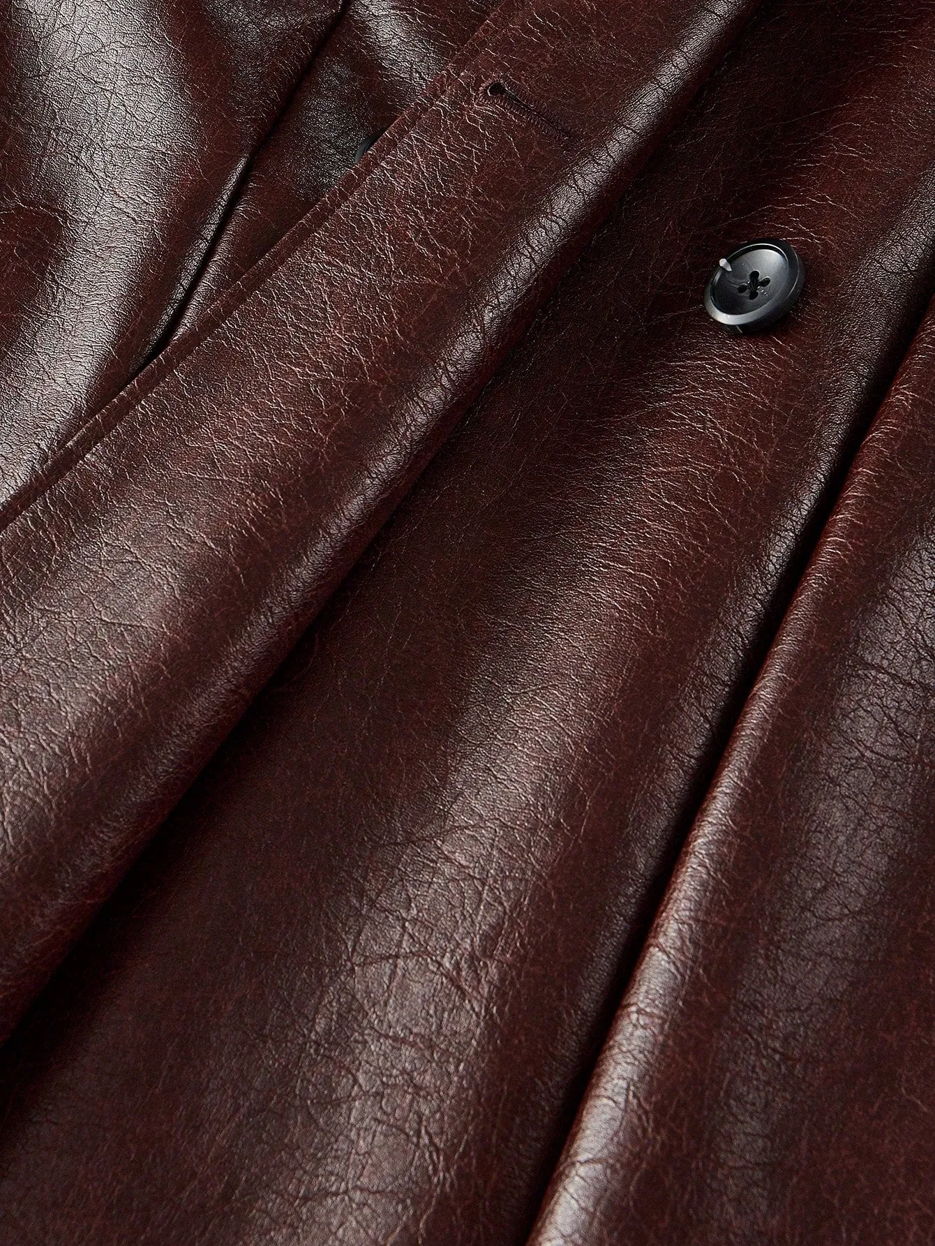 Abrigo trench de doble botonadura