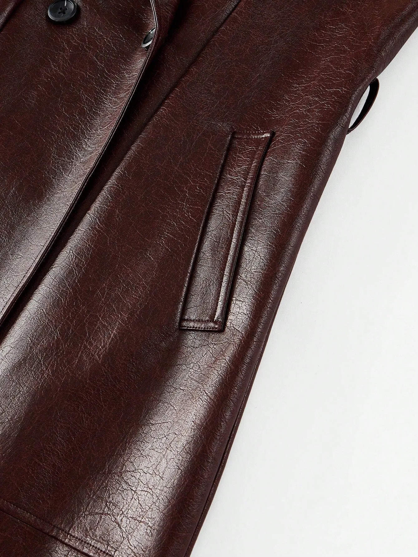 Abrigo trench de doble botonadura