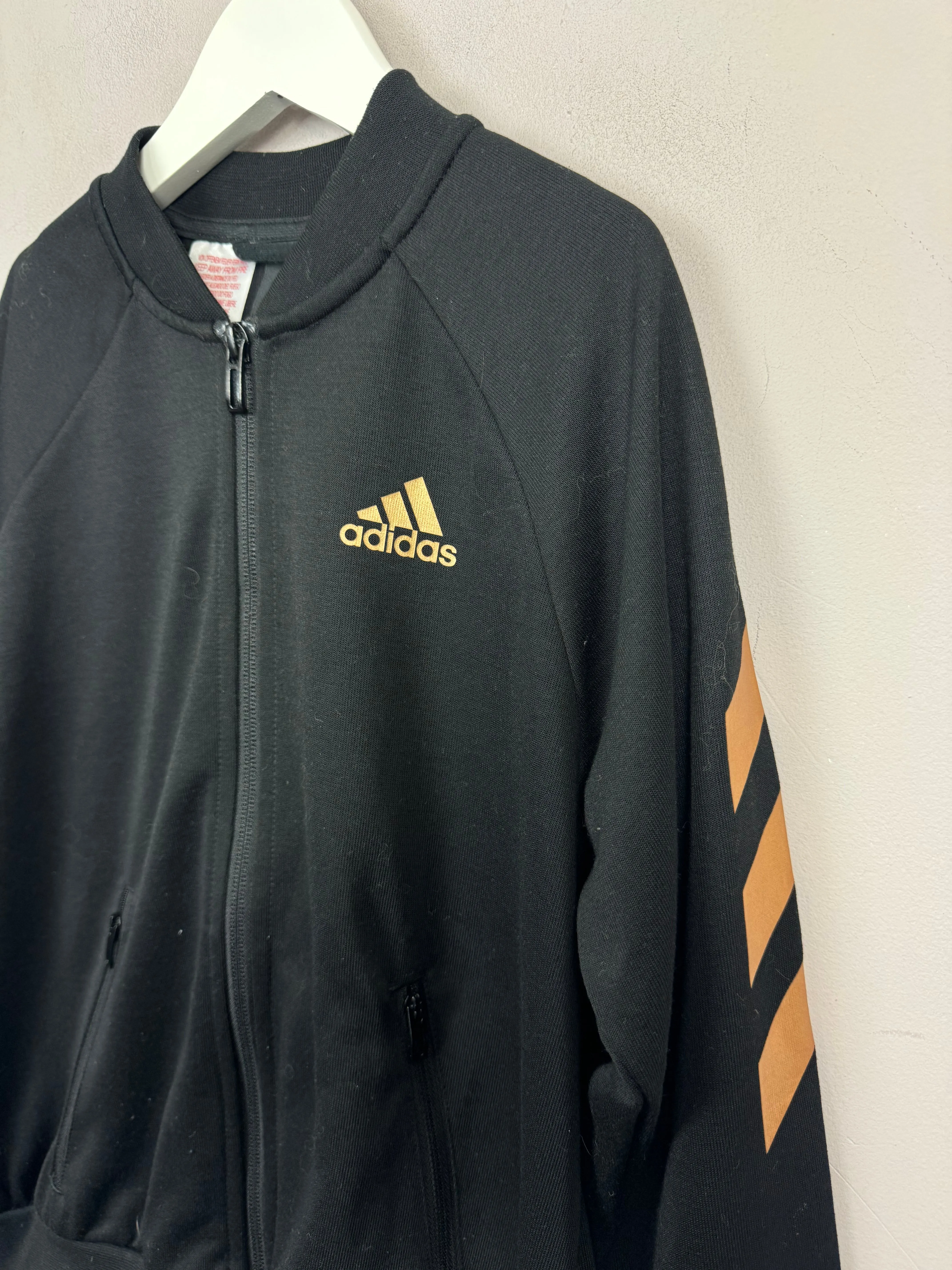 Adidas black/gold zip though tracksuit top 9-10y