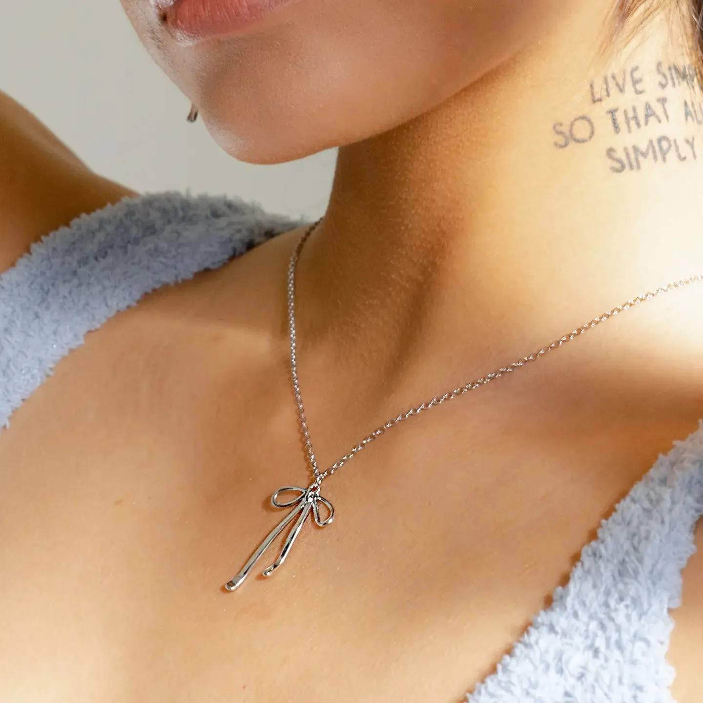Bad to the Bow Necklace - Silver Plated