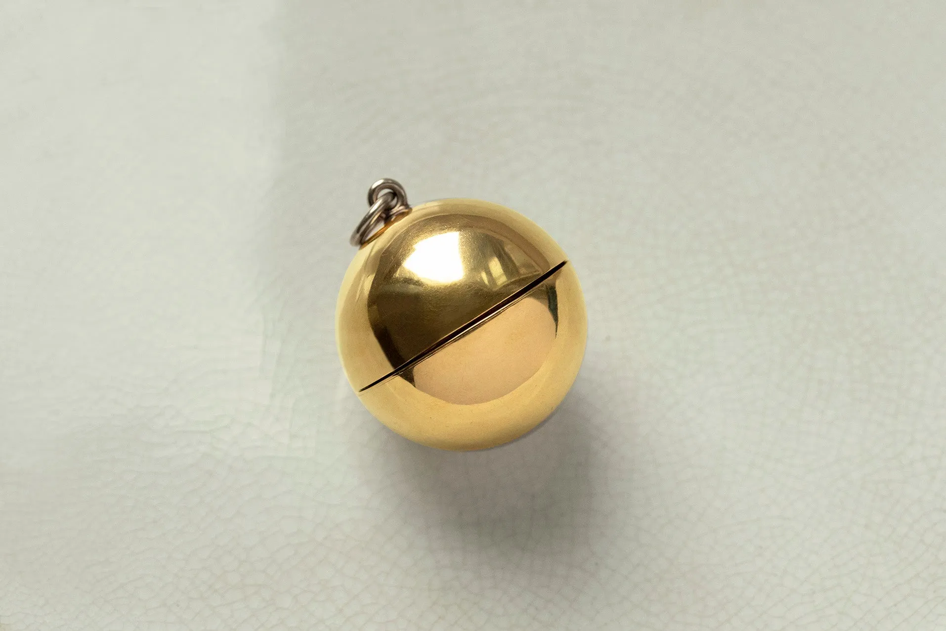 Early 20th Century Large Gold Orb Locket