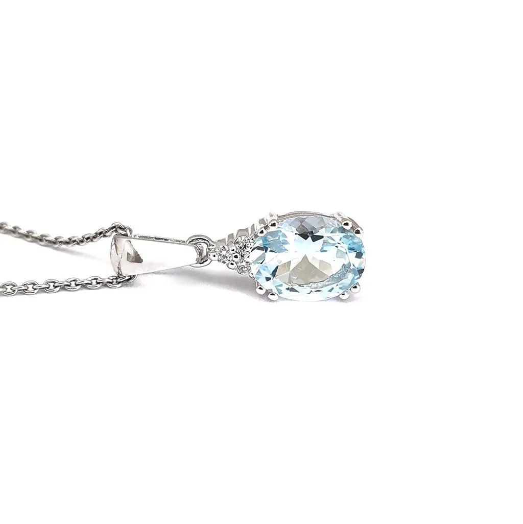 Elegant Oval Cut Aquamarine and Trilogy Diamond Pendant