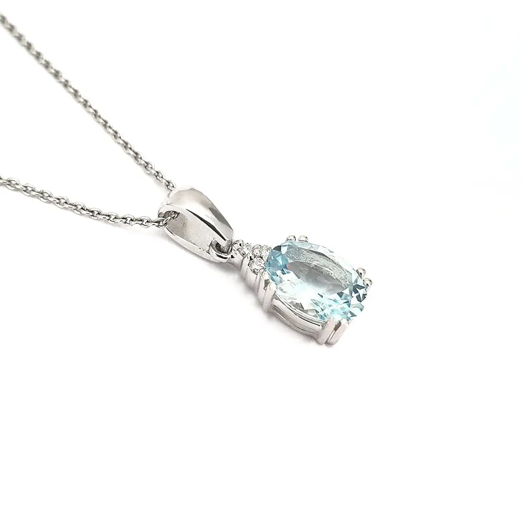Elegant Oval Cut Aquamarine and Trilogy Diamond Pendant
