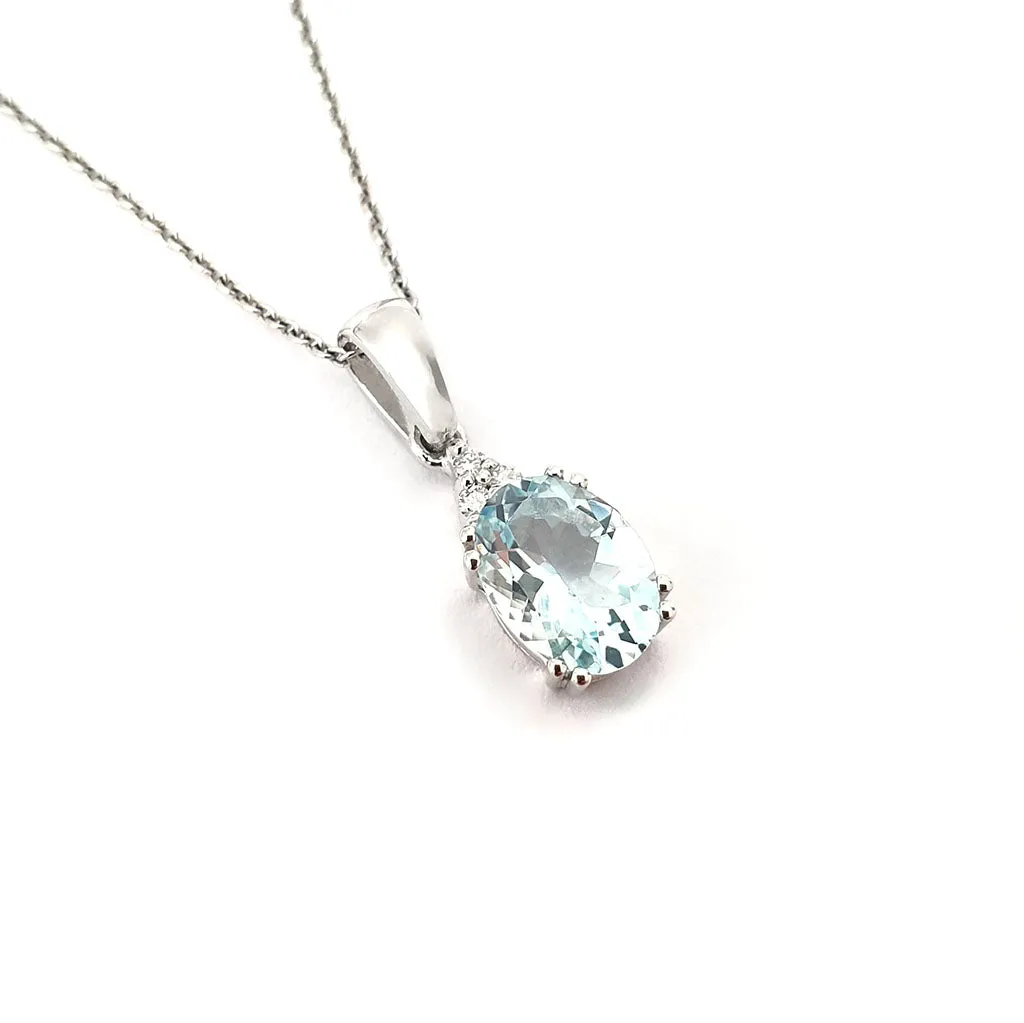 Elegant Oval Cut Aquamarine and Trilogy Diamond Pendant