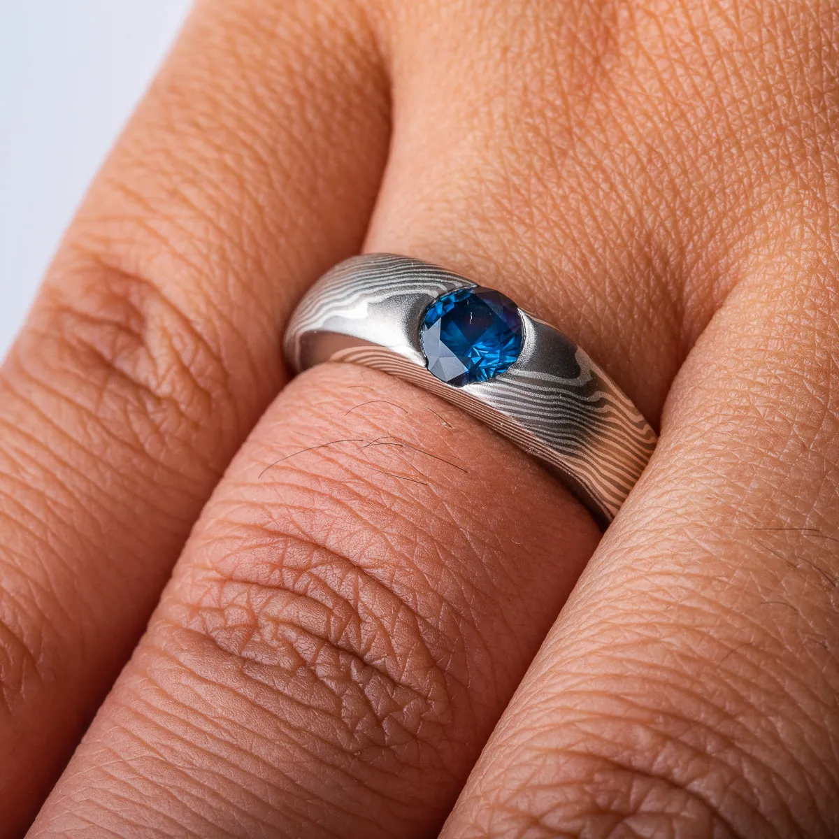 Elegant Sapphire Cathedral Ring in Twist Pattern