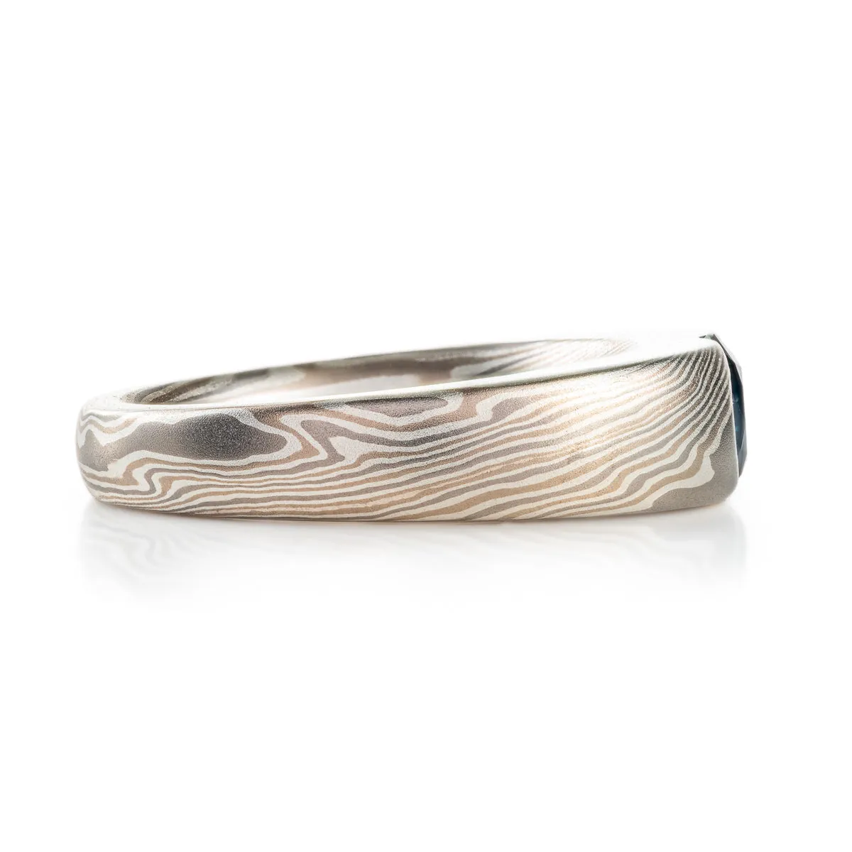Elegant Sapphire Cathedral Ring in Twist Pattern