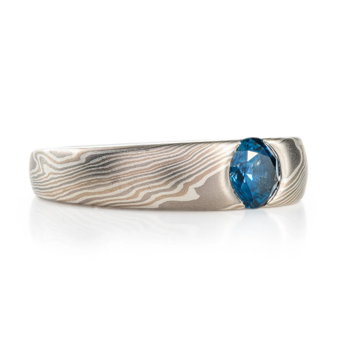 Elegant Sapphire Cathedral Ring in Twist Pattern