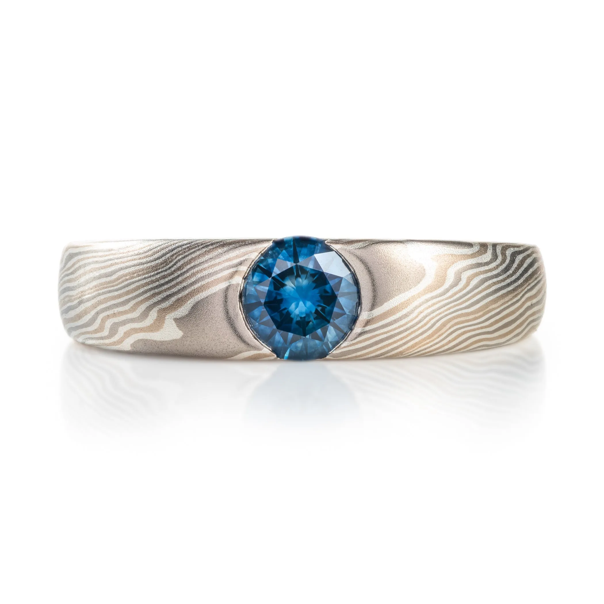 Elegant Sapphire Cathedral Ring in Twist Pattern