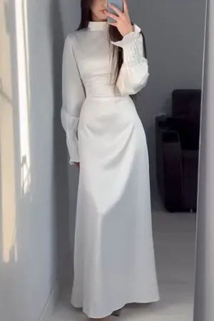 Elegant waisted pleated cuff dress