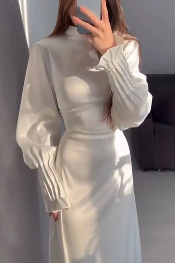 Elegant waisted pleated cuff dress