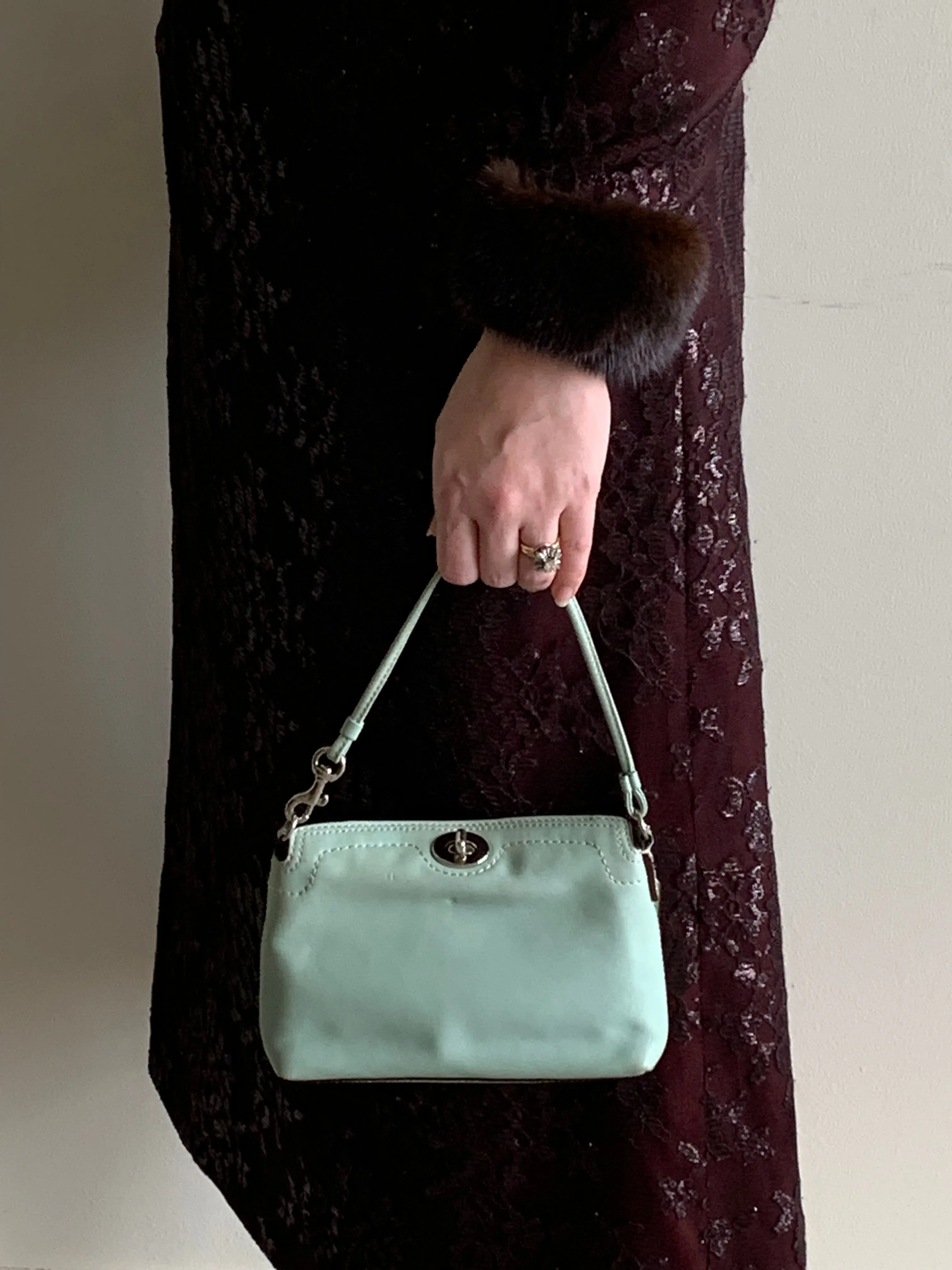 Mint Coach wristlet handbag
