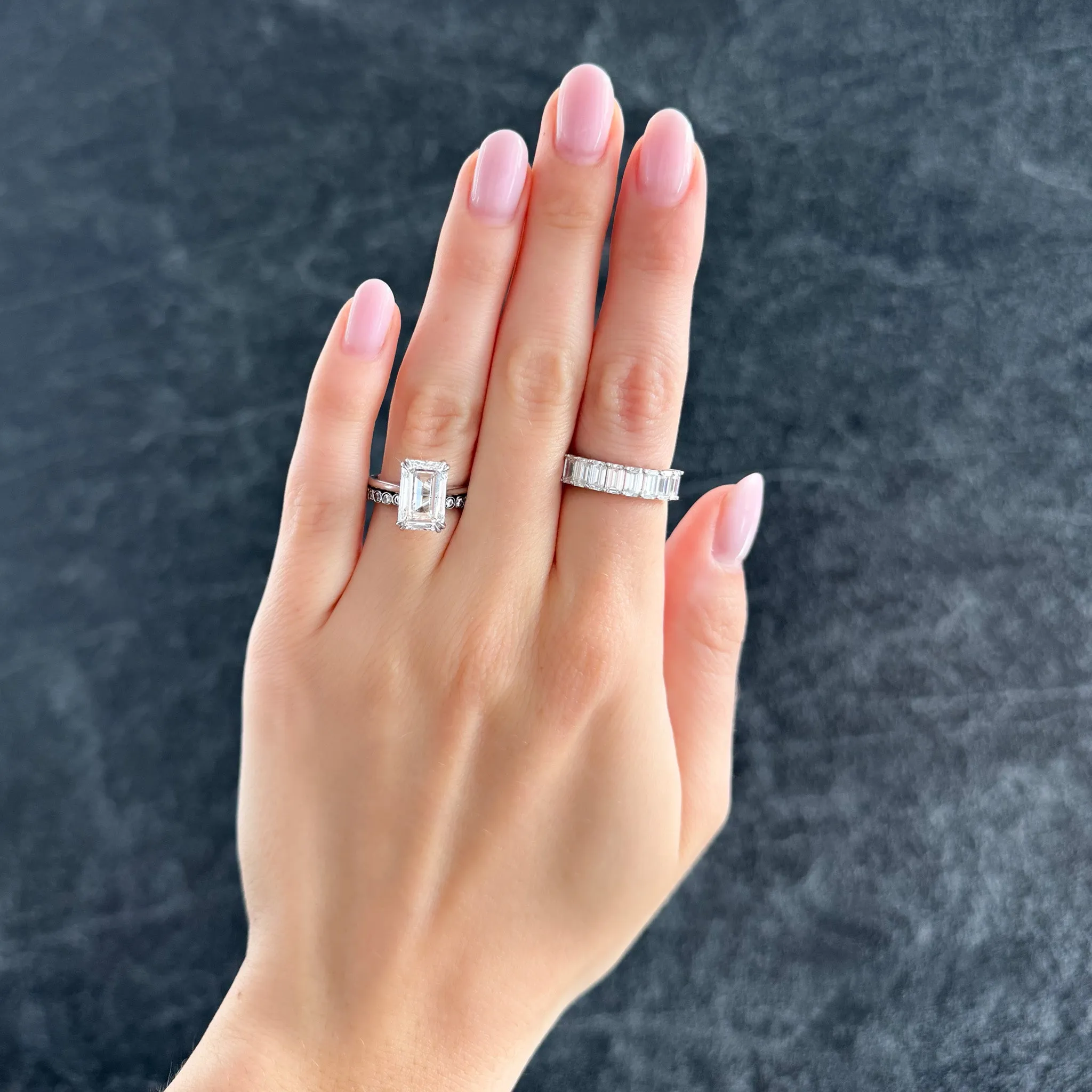 Thin   Simple Solitaire Engagement Ring With North South Emerald Cut Diamond