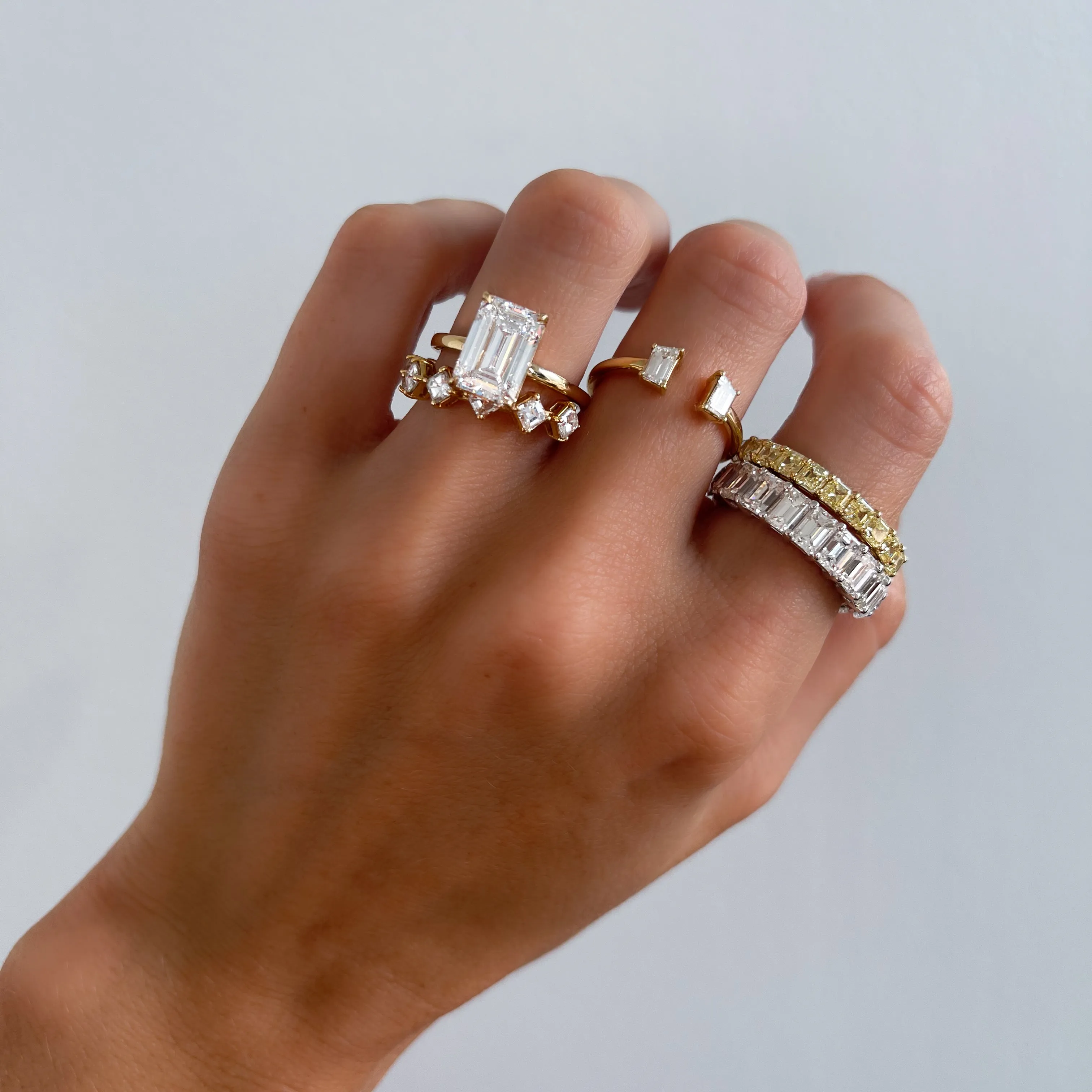 Thin   Simple Solitaire Engagement Ring With North South Emerald Cut Diamond
